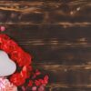 overhead view of valentine's day background on rustic wood.