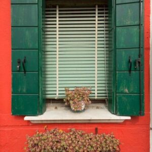 colorful windows and flowers in murano italy