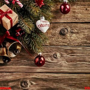 christmas decorations on rustic wood background