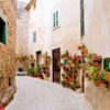 majorca valldemossa typical with flower pots in facade