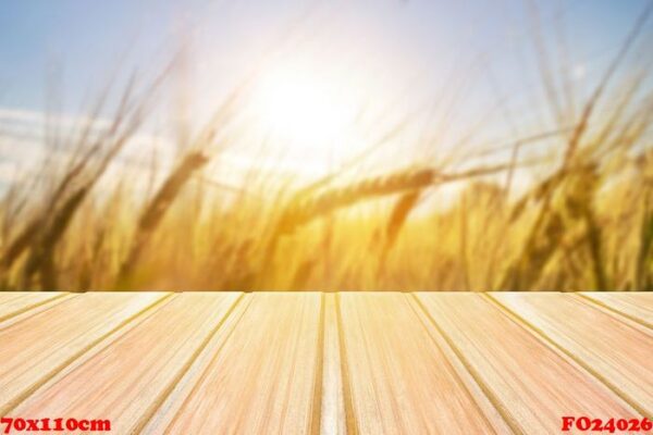 empty wooden table with blurred grasses, grain on background, wheat,barley, rye.summer, spring background