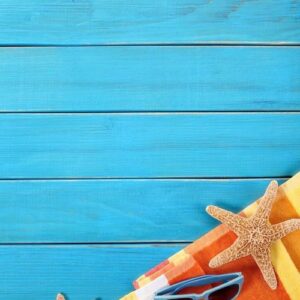 beach scene with blue wood decking