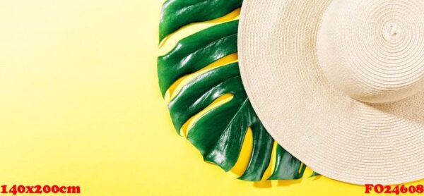 straw hat on bright yellow sunny background