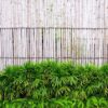 close up of wall made of vintage bamboo fence