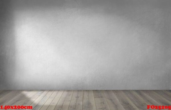 gray wall in an empty room with a wooden floor