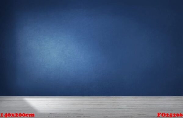 dark blue wall in an empty room with a concrete floor