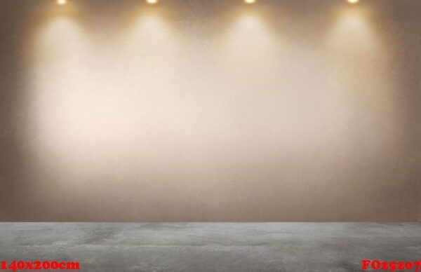 faded orange wall with a row of spotlights in an empty room