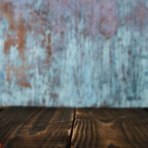 empty brown wooden table and blue background