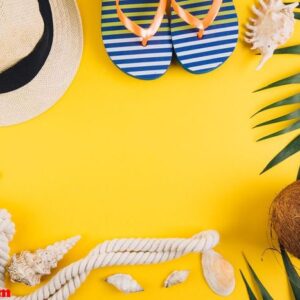 summer concept. travel accessories: a straw hat, a coconut, a ro