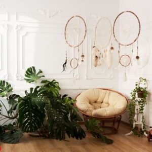 room interior with tropical houseplants monstera, dreamcatchers