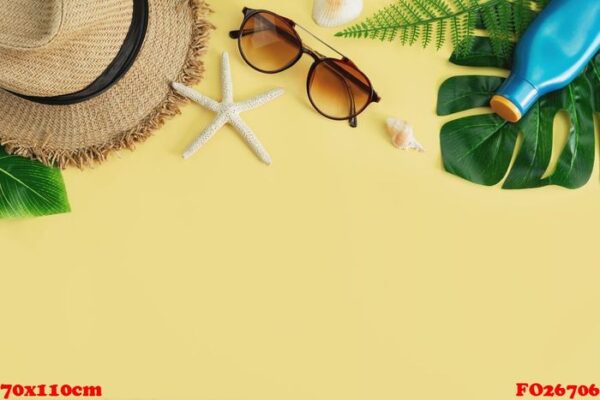 travel accessories items on yellow background, summer vacation concept