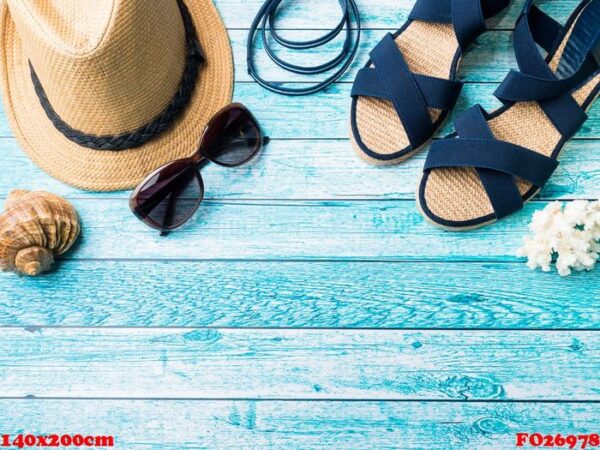 summer background straw hat bracelets sandals sunglasses seashells on a blue table copy space