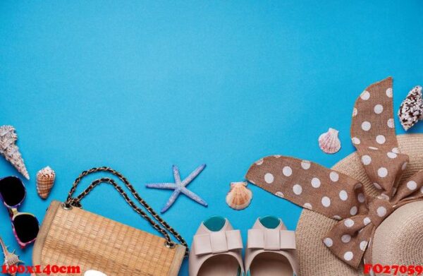 straw hat, sunglasses and shoes on blue background