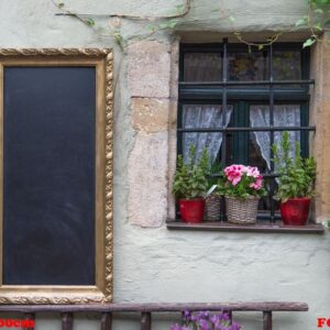 the black chalk board ready to be filled on the classic old wall