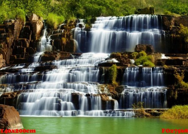 tropical rainforest landscape with flowing pongour waterfall in