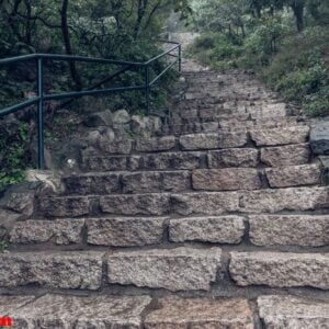 rough stone steps leading to a small village