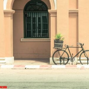 vintage bicycle on wall background