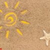 sun sign drawn and starfish, seashells on sand. creative top view copy space top view