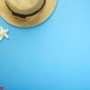 summer holiday accessories branch blue background