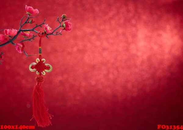 chinese new year's decoration flowers plum blossoming with chinese knot on red bokeh background