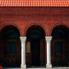 facade of an old red brick building