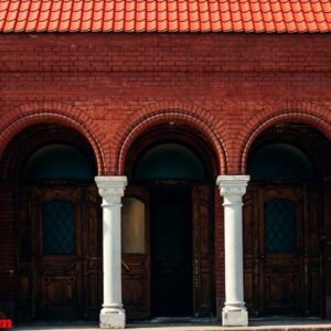 facade of an old red brick building