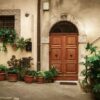 italian courtyard patio with old door and plant pots