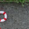 rescue buoy hanging on the wall with copy space