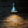 old retro lamp on grunge brick wall