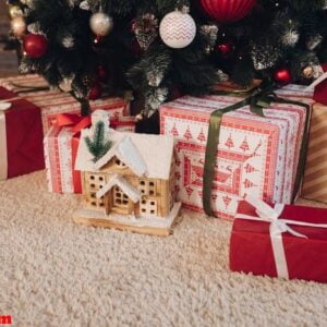 beautiful wrapped christmas presents under the tree.