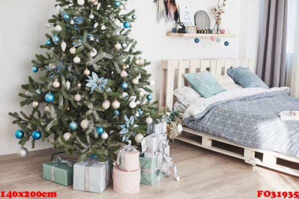 beautiful holdiay decorated room with christmas tree with presents under it