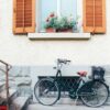 old bicycle parking front of door house