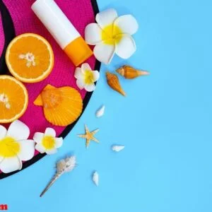 beautiful summer holiday, beach accessories, orange, hat and sun