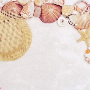 summer time concept with seashells, star, sea pebbles, straw ha