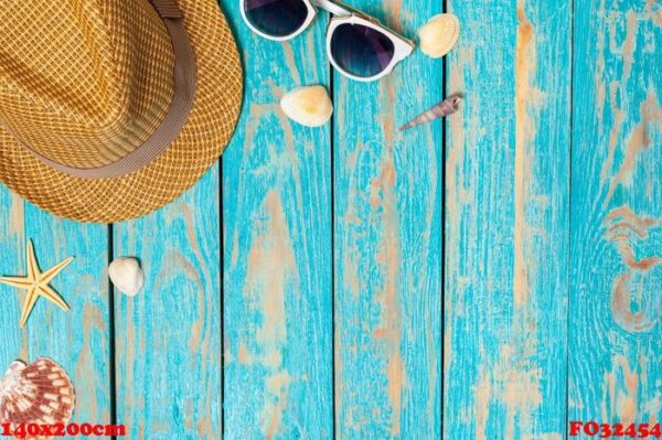 summer composition of beach accessories and seashells top view