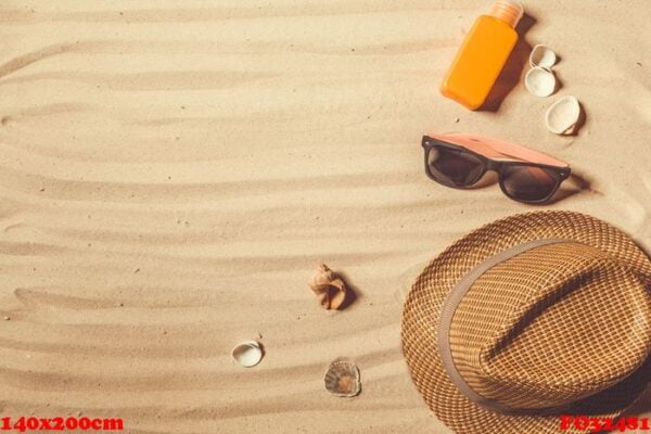 summer hat put on the tropical sand beach