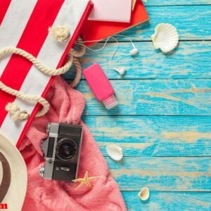 beach accessories on the blue wooden board