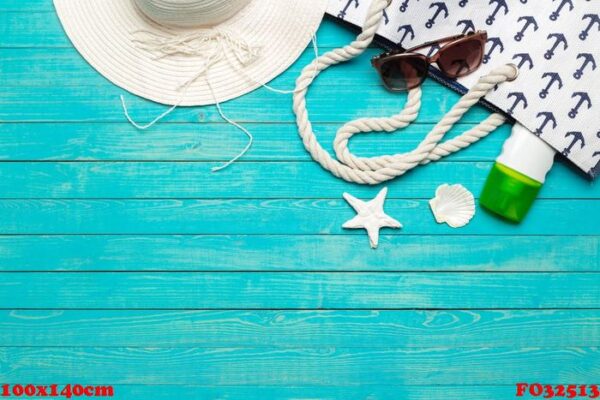 beach accessories on wooden table.