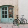 old bicycle parking front of door house