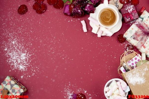 a cup of fragrant coffee and new year decor on a red background.