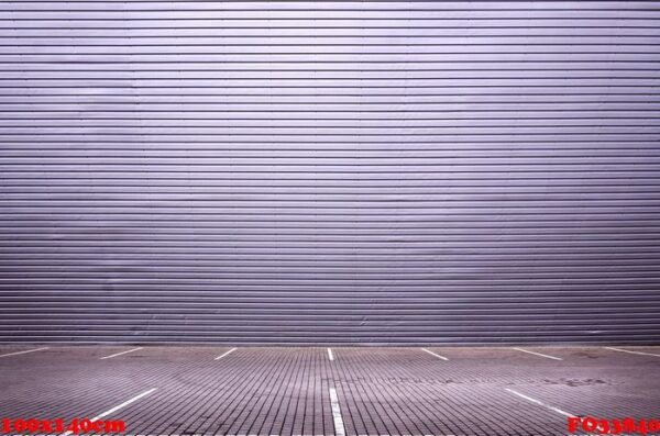 empty parking spaces on the background of a metal wall with spac