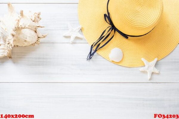 top view of summer yellow female hat with sunglasses and shell a