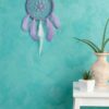 lilac dream catcher on aquamarine