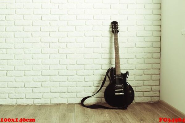 electric guitar body and neck detail on wooden background