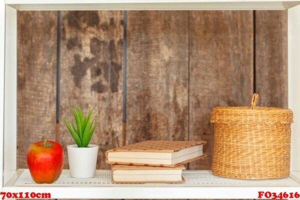 stylish white bookshelf against grunge wooden wall