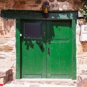 old green door of a spanish house