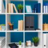 white office shelves with different stationery, close up