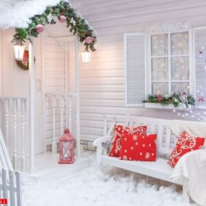 winter exterior of a country house with christmas decorations.