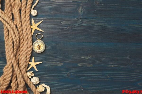 nautical background. sailing rope with a compass