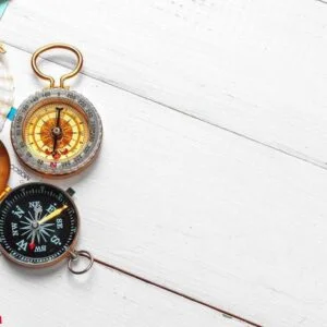 time to travel. idea for tourism with tickets and compass.